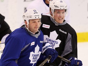 Tim Connolly, left, and Jake Gardiner battle in front of the net at practice last week. (CRAIG ROBERTSON/Toronto Sun)