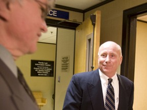 Former Ontario cabinet minister John Snobelen arrives at an Oakville courthouse to fight two gun-related charges. (Toronto Sun files)