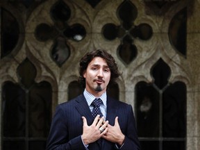 Liberal MP Justin Trudeau speaks following Question Period in the House of Commons on Parliament Hill in Ottawa December 14, 2011.      REUTERS/Chris Wattie