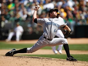 Reliever Casey Janssen is excited about the Jays' prospects in 2012 after signing a multi-year deal on Monday. (REUTERS)