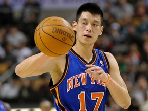 Knicks guard Jeremy Lin makes a pass against the Raptors at the Air Canada Centre in Toronto, Ont., Feb. 14, 2012. (MIKE CASSESE/Reuters)