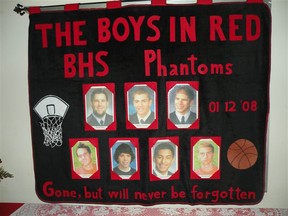 A banner honouring the seven Bathurst, N.B., high school basketball players who were killed in a 2008 van crash.