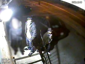 Three men wanted in a sexual assault investigation were caught on a surveillance camera, Toronto Police said. (Supplied photo)
