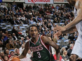 DALLAS - DECEMBER 13: Brandon Jennings #3 of the Milwaukee Bucks drives against Tyson Chandler #6 of the Dallas Mavericks during a game on December 13, 2010 at the American Airlines Center in Dallas, Texas. NOTE TO USER: User expressly acknowledges and agrees that, by downloading and or using this photograph, User is consenting to the terms and conditions of the Getty Images License Agreement. Mandatory Copyright Notice: Copyright 2010 NBAE   Glenn James/NBAE via Getty Images/AFP