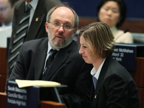 TTC Chairman Karen Stintz  and Joe Mihevc at Monday’s city council meeting. Stintz announced she is leading a group of 24 councillors to derail Mayor Rob Ford’s transit plan.  (CRAIG ROBERTSON/Toronto Sun)