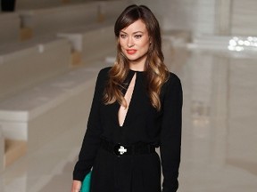 Actress Olivia Wilde poses for a photograph before watching the Ralph Lauren Spring/Summer 2012 collection during New York Fashion Week, Sept. 15, 2011.  (REUTERS/Lucas Jackson)