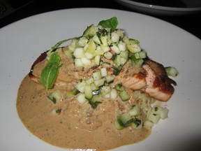 Culina's salmon in goat cheese almond sauce, topped with cucumber salsa.