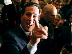 U.S. Republican presidential candidate and former U.S. Senator Rick Santorum  talks to supporters in the crowd after his primary night rally at the St. Charles Convention Center in St. Charles, Missouri, February 7, 2012.  REUTERS/Sarah Conard