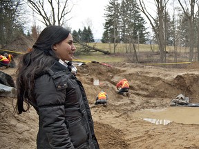 Land owner Habiba Ahmed (left) talks with archeologist Holly Martelle of Timmins Martelle Heritage Consultants at the site of a preliminary archeological excavation on Ahmed's property on Oxbow Road, just south of Brantford, Ont., on Thursday, February 2, 2012.  
BRIAN THOMPSON/QMI Agency