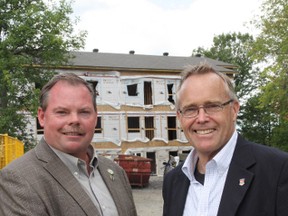 South Stormont mayor Bryan McGillis (left) and MPP Jim Brownell celebrate the expansion of Inglewood Court on Monday. Construction on the facility’s 21-unit expansion began earlier this year. (MELISSA DI COSTANZO/QMI AGENCY)