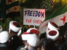 Muslim Sunni clerics, take part in a rally in the port-city of Sidon, southern Lebanon, against attacks by Syrian President Bashar al-Assad's forces on the Syrian city of Homs February 9, 2012. (REUTERS/Ali Hashisho)