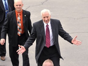 Jerry Sandusky, former Penn State defensive coordinator, leaves the Centre County Courthouse in Bellefonte, Pennsylvania February 10, 2012.  (REUTERS/Pat Little)