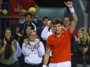 Canada's Milos Raonic celebrates his win over France's Julien Benneteau during Davis Cup tennis tournament in Vancouver, British Columbia February 10, 2012.  (REUTERS/Andy Clark)