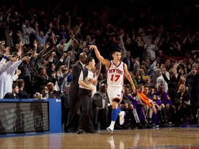 Jeremy Lin #17 of the New York Knicks reacts to the crowd after hitting a three point shot during the game against the Los Angeles Lakers on February 10, 2012 at Madison Square Garden in New York City. (Nathaniel S. Butler/NBAE via Getty Images/AFP)
