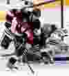 _06U5144 - February 11, 2012  - Ottawa Senators' Nick Foligno (71) tries a wrap-around on Edmonton Oilers' goalie Nikolai Khabibulin (35) while Eric Belanger (20) defends during the second period of NHL hockey action at Scotiabank Place in Kanata Saturday, February 11, 2012.  (DARREN BROWN/QMI AGENCY)