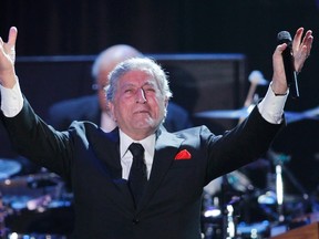 Tony Bennett proclaims "Whitney" at the end of his performance during the 2012 Pre-Grammy Gala & Salute to Industry Icons at the Beverly Hilton Hotel in Beverly Hills, California February 11, 2012. (REUTERS/Danny Moloshok)