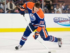 Defenceman Andy Sutton will be back with the Oilers for one more season. (Ian Kucerak/QMI Agency)