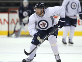 Fehr took part in team drills at practice Monday, but he hasn’t been skating on game days, having been benched three times this month, including the last two games in a row. (JASON HALSTEAD/Winnipeg Sun)