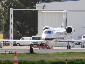 A private jet thought to be carrying the body of Whitney Houston to New Jersey, taxis at Van Nuys Airport in Los Angeles, California, February 13, 2012. (REUTERS/Gene Blevins)