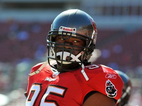 Defensive tackle Albert Haynesworth gets set for a play against the Texans at Raymond James Stadium in Tampa, Fla., Nov. 13, 2011. (AL MESSERSCHMIDT/Getty Images/AFP)