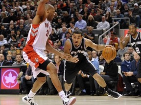 San Antonio rookie Cory Joseph drives past another GTA product, Jamaal Magloire during Wednesday night's Spurs' victory over the Raptors at the ACC. (REUTERS)