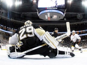 Penguins goaltender Marc-Andre Fleury makes a save against the Ducks at the Consol Energy Center in Pittsburgh, Penn., Feb. 15, 2012. (JUSTIN K. ALLER/Getty Images/AFP)