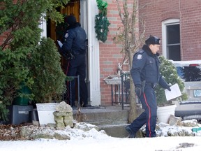 Toronto Police officers talked with neighbours in the days following Boxing Day abduction and sexual assault of a four-year-old girl.
 (DAVE THOMAS, Toronto Sun)