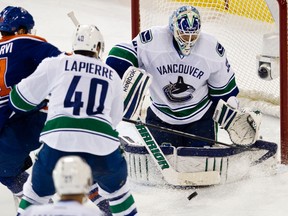 Magnus Paajarvi can't get past Cory Schneider during the third period of the Edmonton Oilers 5-2 loss against the Vancouver Canucks at Rexall Place on Sunday.
Codie McLachlan, Edmonton Sun