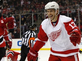 Detroit Red Wings' Pavel Datsyuk reacts after scoring a goal against the New Jersey Devils during the third period of their NHL hockey game in Newark, New Jersey, Dec. 11, 2010. (REUTERS/Jessica Rinaldi)