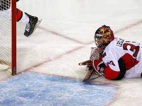 Pascal Leclaire got hit with a puck while sitting on the bench. (OTTAWA SUN FILE PHOTO)