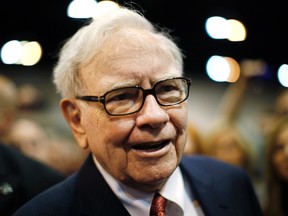 Berkshire Hathaway Chairman Warren Buffett wanders at the company trade show before his company's annual meeting in Omaha, Nebraska in this April 30, 2011 file photo. REUTERS/Rick Wilking/Files