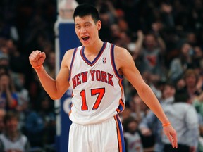 New York Knicks point guard Jeremy Lin reacts in the fourth quarter against the Dallas Mavericks during their NBA basketball game at Madison Square Garden in New York, February 19, 2012. REUTERS/Adam Hunger