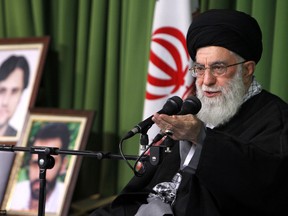 A handout photo provided by the office of Iran's supreme leader Ayatollah Ali Khamenei shows him speaking during a meeting with local nuclear scientists in Tehran on February 22, 2012. (Handout)