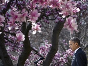 US President Barack Obama arrives to speak about enforcing US trade rights as he accused China of breaking global trade rules by restricting exports of rare earth elements during a statement in the Rose Garden of the White House in Washington, DC, March 13, 2012. Obama also pledged that the US would wield the full force of the law against a US soldier suspected of mounting a shooting rampage which killed Afghan civilians over the weekend. AFP PHOTO / Saul LOEB