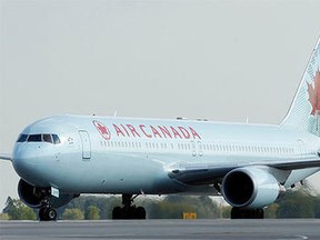 An Air Canada plane is seen in this file photo. (DARREN BROWN/QMI AGENCY)