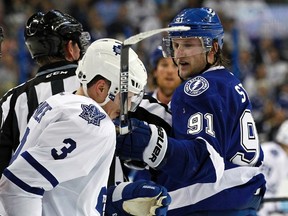 Yes, we know you have 50 goals Steven Stamkos (right), but that doesn’t give you the right to lay the wood to Dion Phaneuf.
