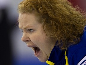 Sweden skip Margaretha Sigfridsson shouts to teammates during their game against the Czech Republic at the World Women's Curling Championships in Lethbridge, Alta., March 18, 2012. (ANDY CLARK/Reuters)