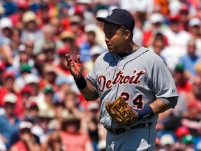 Tigers third baseman Miguel Cabrera holds out a bloodied hand after a ground ball bounced into his face during a spring training game against the Phillies in Clearwater, Fla., March 19, 2012. (STEVE NESIUS/Reuters)