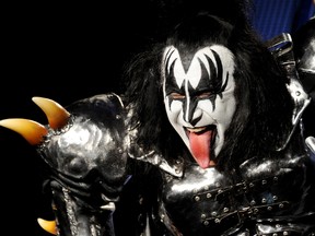Musician Gene Simmons appears onstage to announce their upcoming Motley Crue and KISS co-headlining tour at the Hollywood Roosevelt Hotel on March 20, 2012 in Los Angeles, California.  Kevin Winter/Getty Images/AFP