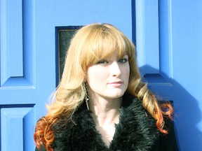 Toronto singer-songwriter Emma-Lee poses on Queen St. on Feb. 08, 2012. (Veronica Henri/QMI Agency)