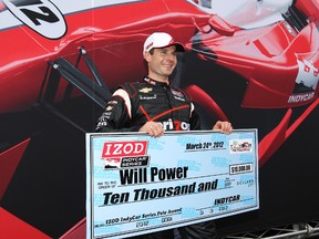 Australia's Will Power celebrates winning the pole position for Sunday's first IndyCar race of the season — the Honda Grand Prix of St. Petersburg. (GETTY IMAGES)