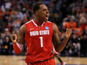 Deshaun Thomas of the Ohio State Buckeyes celebrates towards the end of the game against the Syracuse Orange during the 2012 NCAA Men's Basketball East Regional Final Saturday night at the TD Garden  in Boston. (GETTY IMAGES)