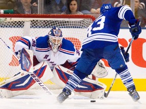 Rangers' Henrik Lundqvist stands his ground as Nazem Kadri bears down on him during the shootout of Saturday's game at the ACC. Lundqvist stopped the Leafs forward. (Reuters)