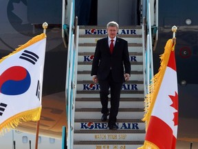 Canada's Prime Minister Stephen Harper arrives at Gimpo airport, for the Nuclear Security Summit, in Seoul March 26, 2012. (REUTERS/Wally Santana)