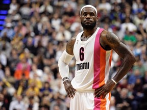 Heat forward LeBron James reportedly dislocated a finger on his left hand, but will still be able to play. (Brent Smith/Reuters)