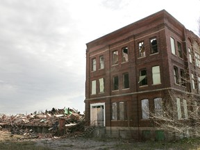 The timekeepers office and office building remain standing on Tuesday, April 3, 2012, after the warehouse was demolished following a fire, Friday, March 30, 2012 at the Cockshutt buildings on Mohawk Street in Brantford. - CHRISTOPHER SMITH, The Expositor,  QMI Agency