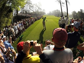 Tiger Woods tees off during Wednesday's practice round at the Masters. (AFP PHOTO)