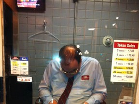 Passenger Earl Campbell snapped this photo Wednesday night of a TTC fare collector apparently napping on the job at the Summerhill station.