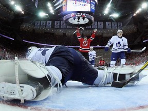 New Jersey's David Clarkson  scores on Toronto netminder James Reimer. (Getty)