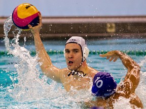 Canada's men's water polo team, shown here in action against Argentina this week, lost to Greece Saturday 10-6. (Edmonton Sun file)